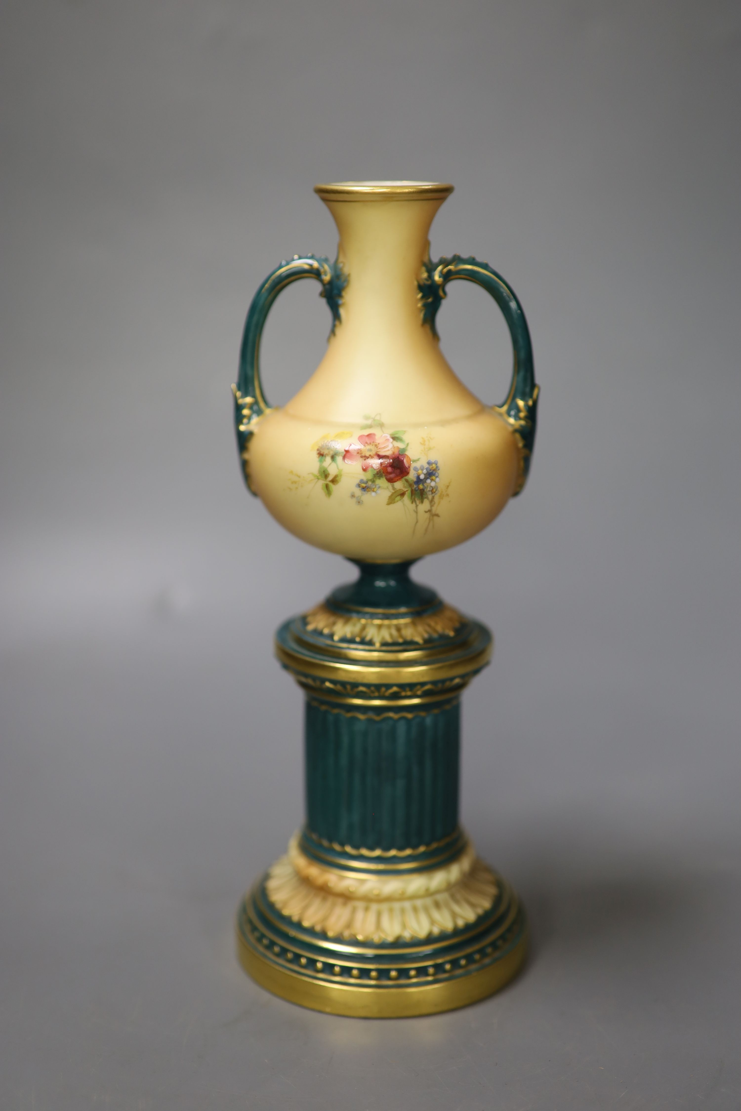 A Royal Worcester blush ivory vase, a rare version manufactured with a green neo-classical pedestal date mark 1900, height 24cm